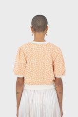 Orange and white daisies short puff sleeved top