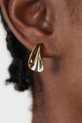 Gold pinched stud earrings
