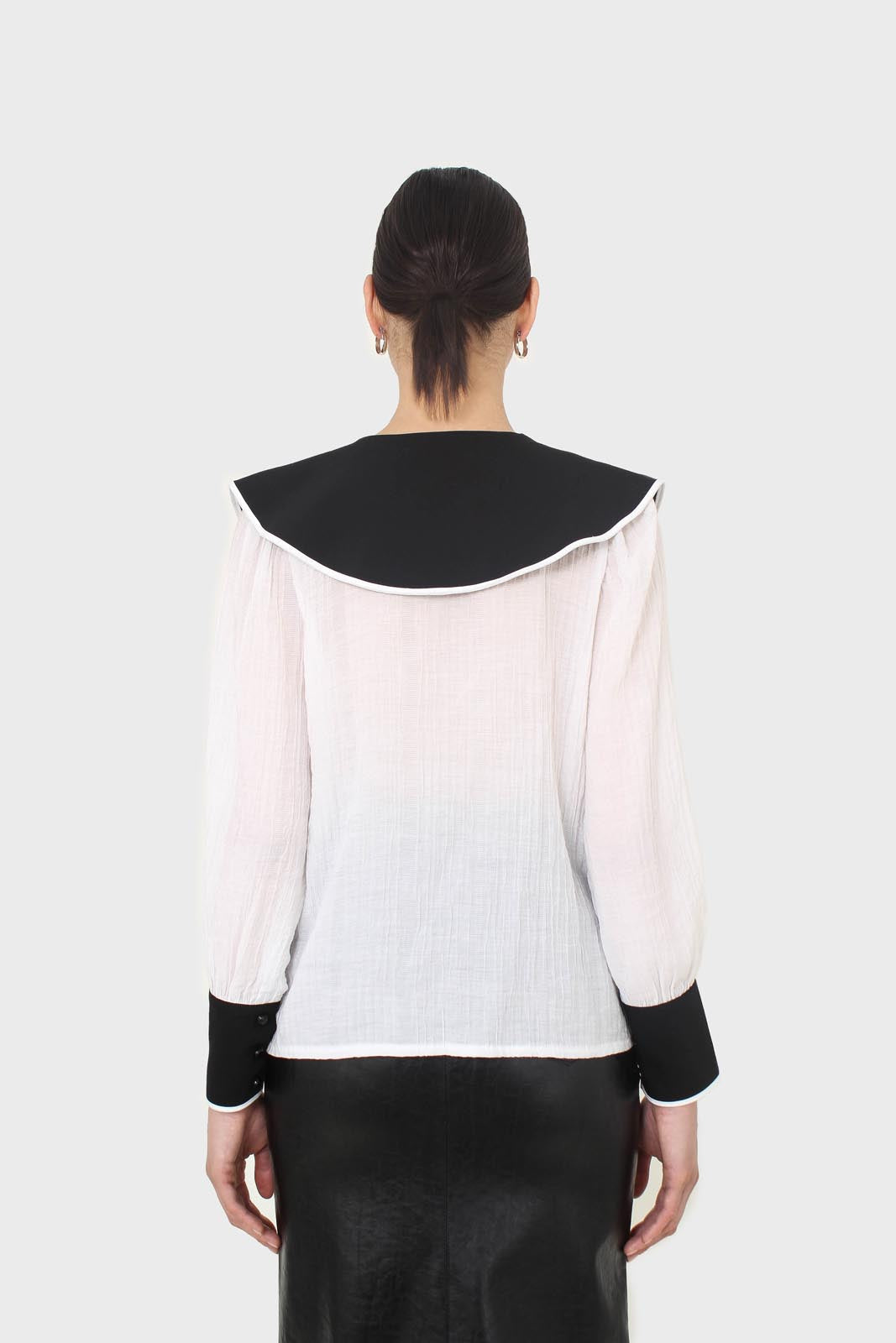 Ivory and black oversized pointed collar blouse
