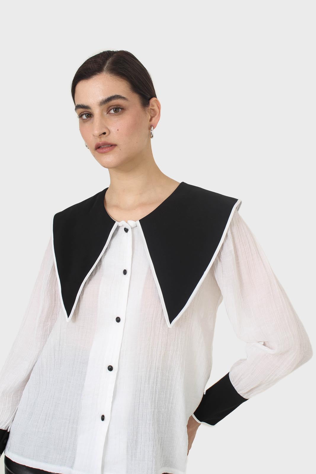 Ivory and black oversized pointed collar blouse