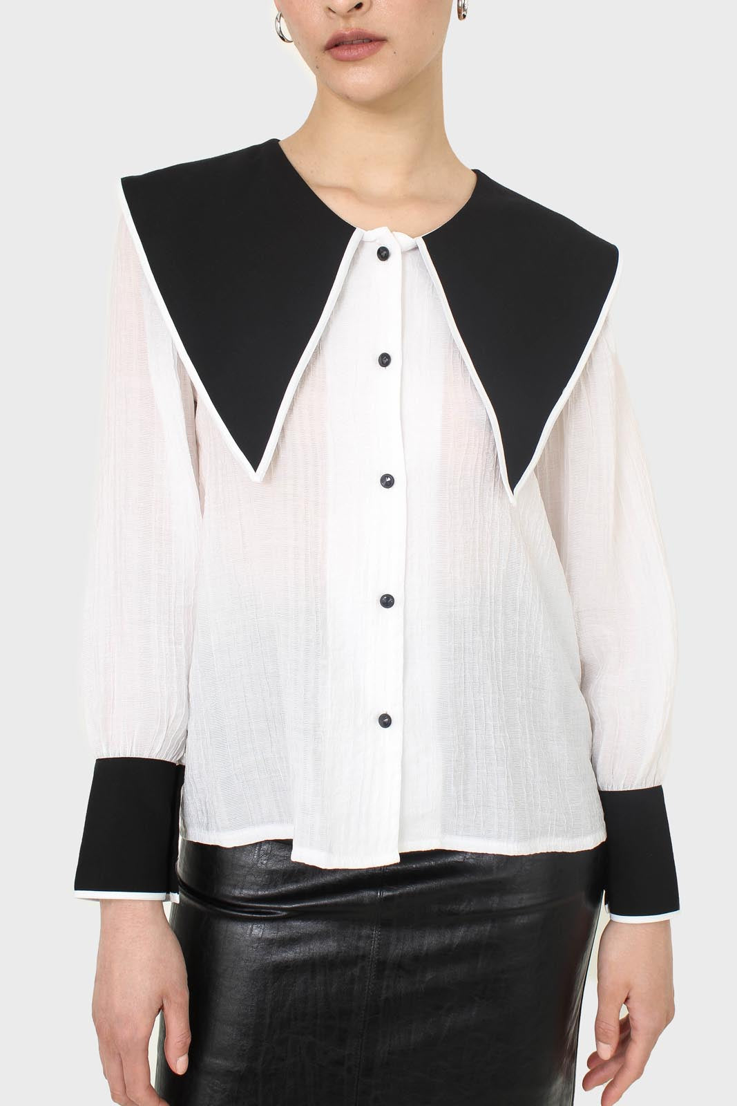 Ivory and black oversized pointed collar blouse