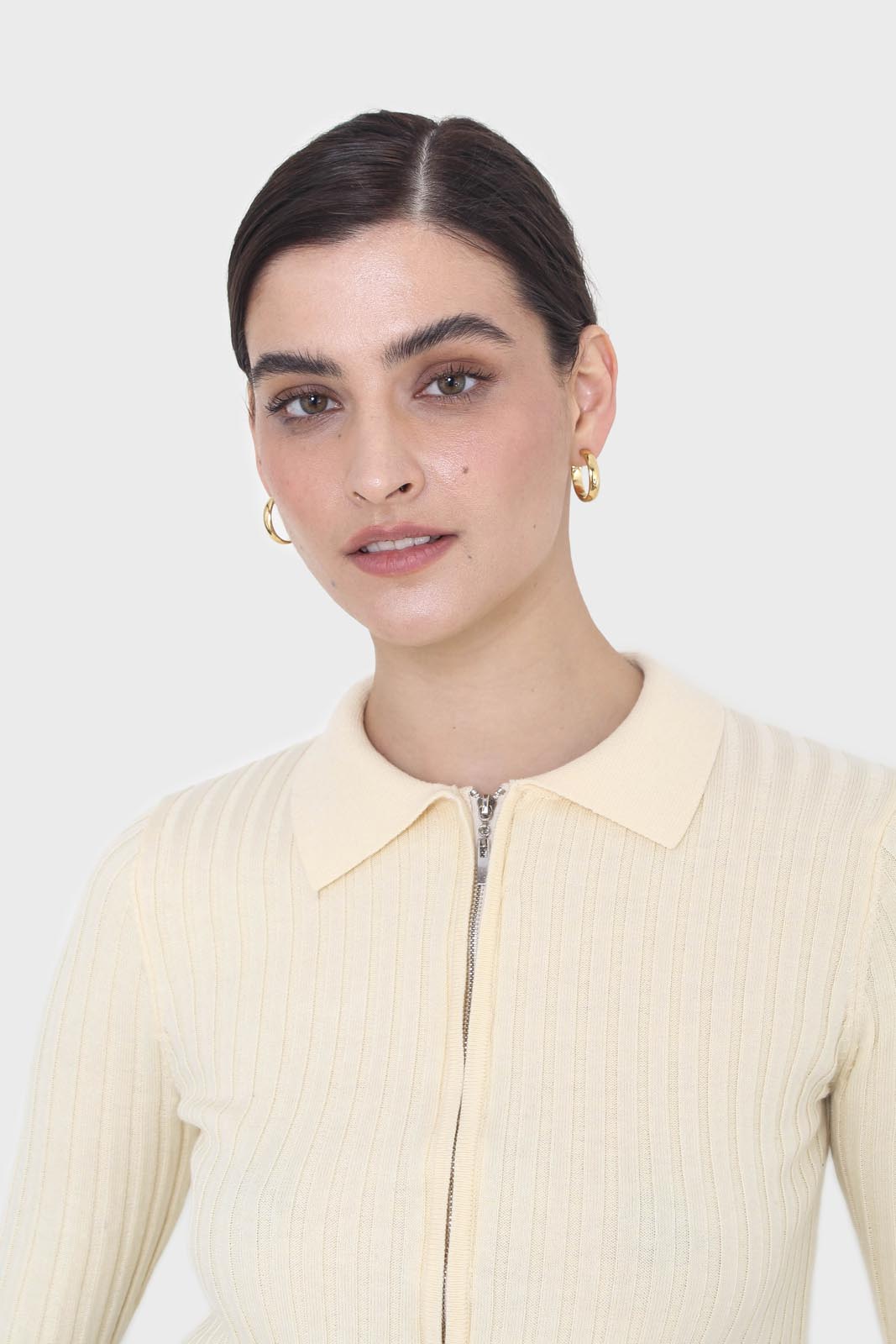 Pale yellow zip up fitted knit top