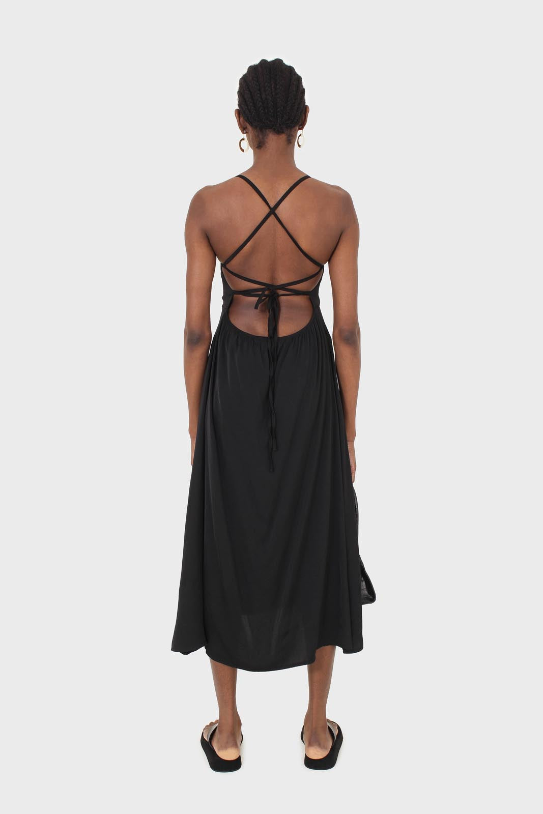 Black strappy tie back dress