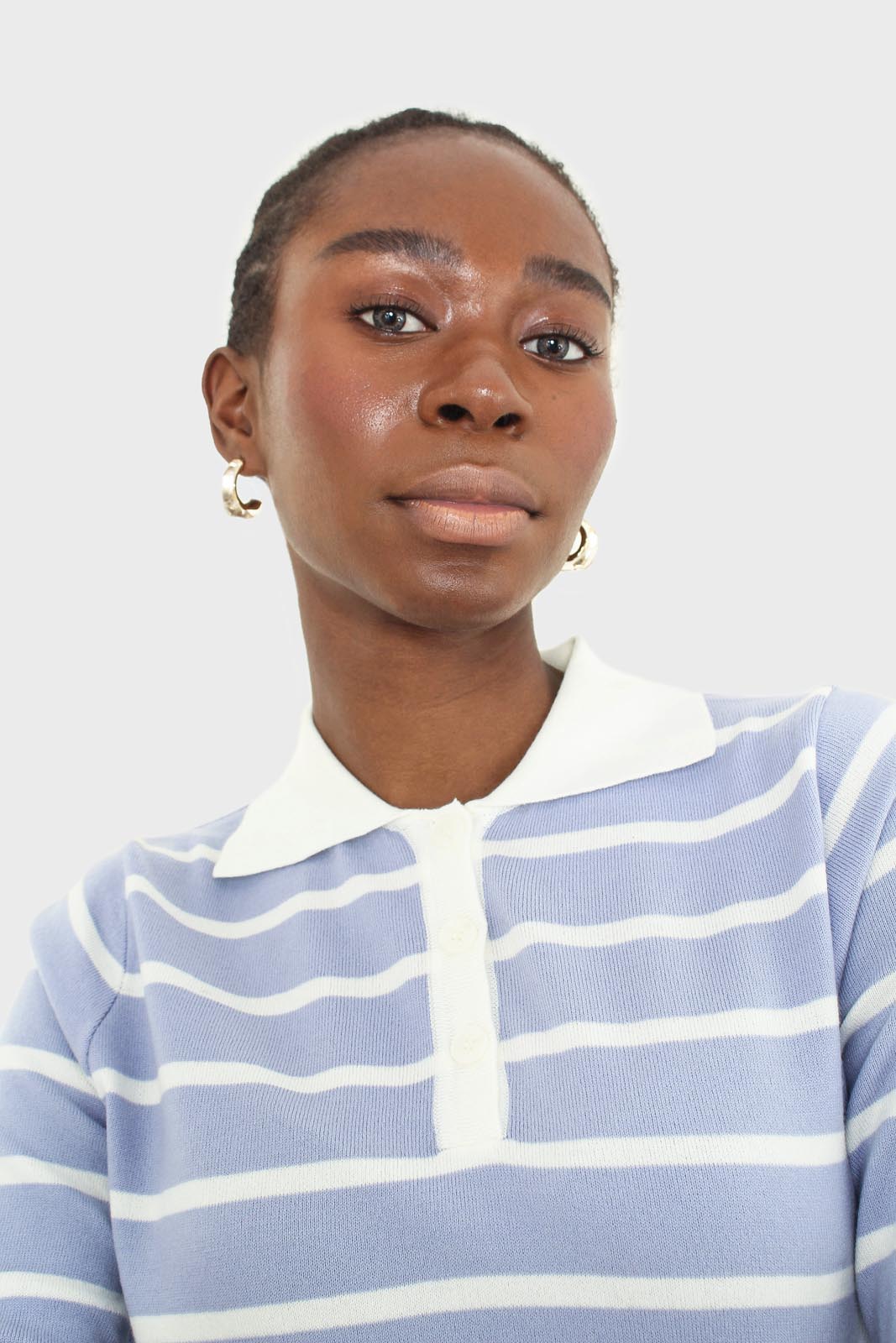Blue striped polo knit top