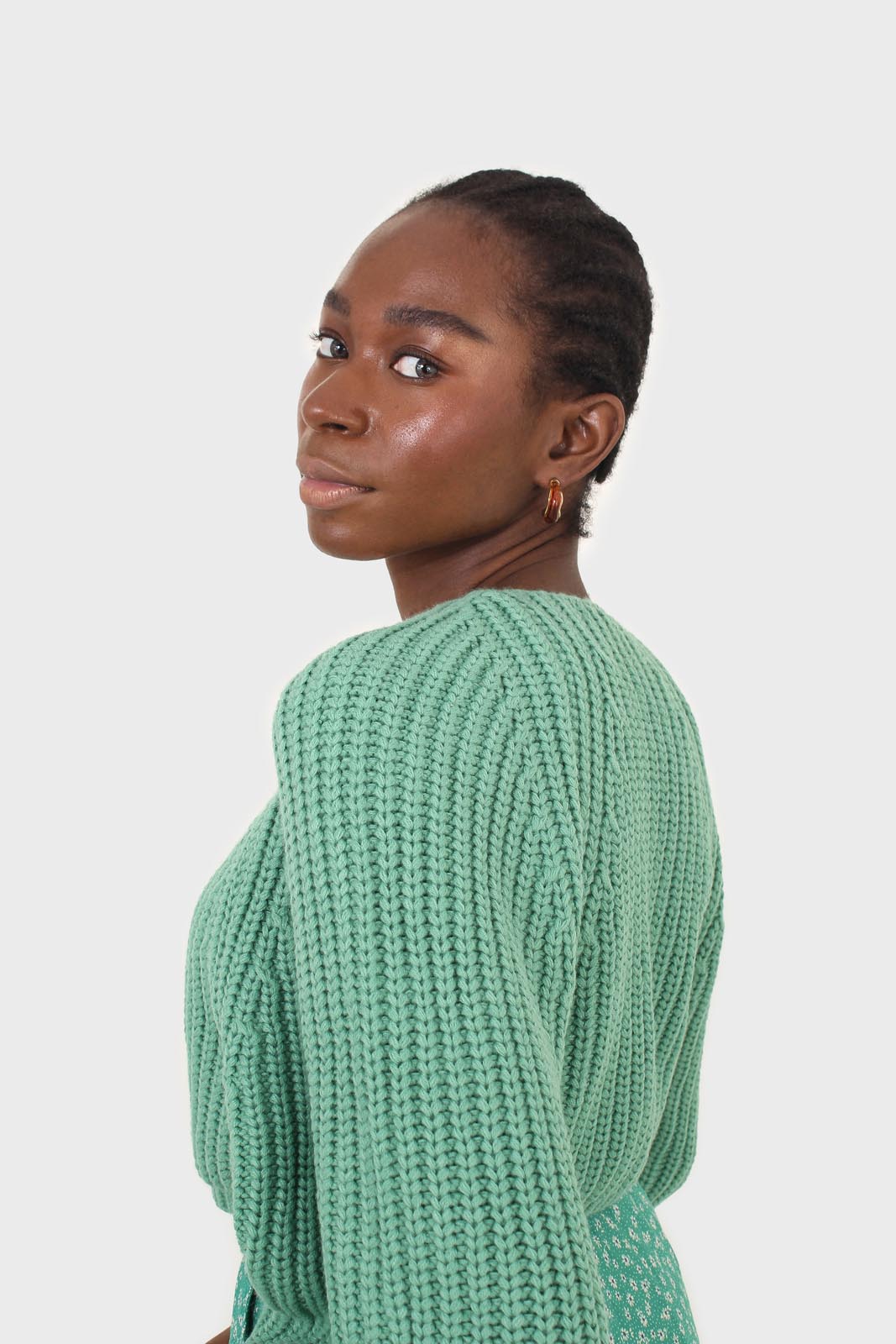 Green cross over balloon sleeve sweater