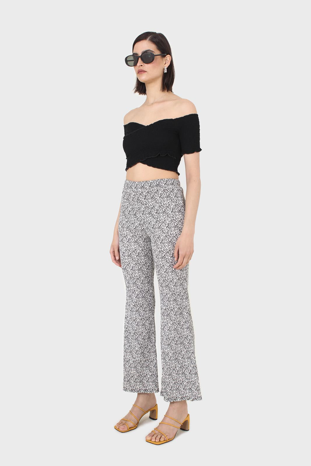 Ivory and charcoal dappled flare trousers