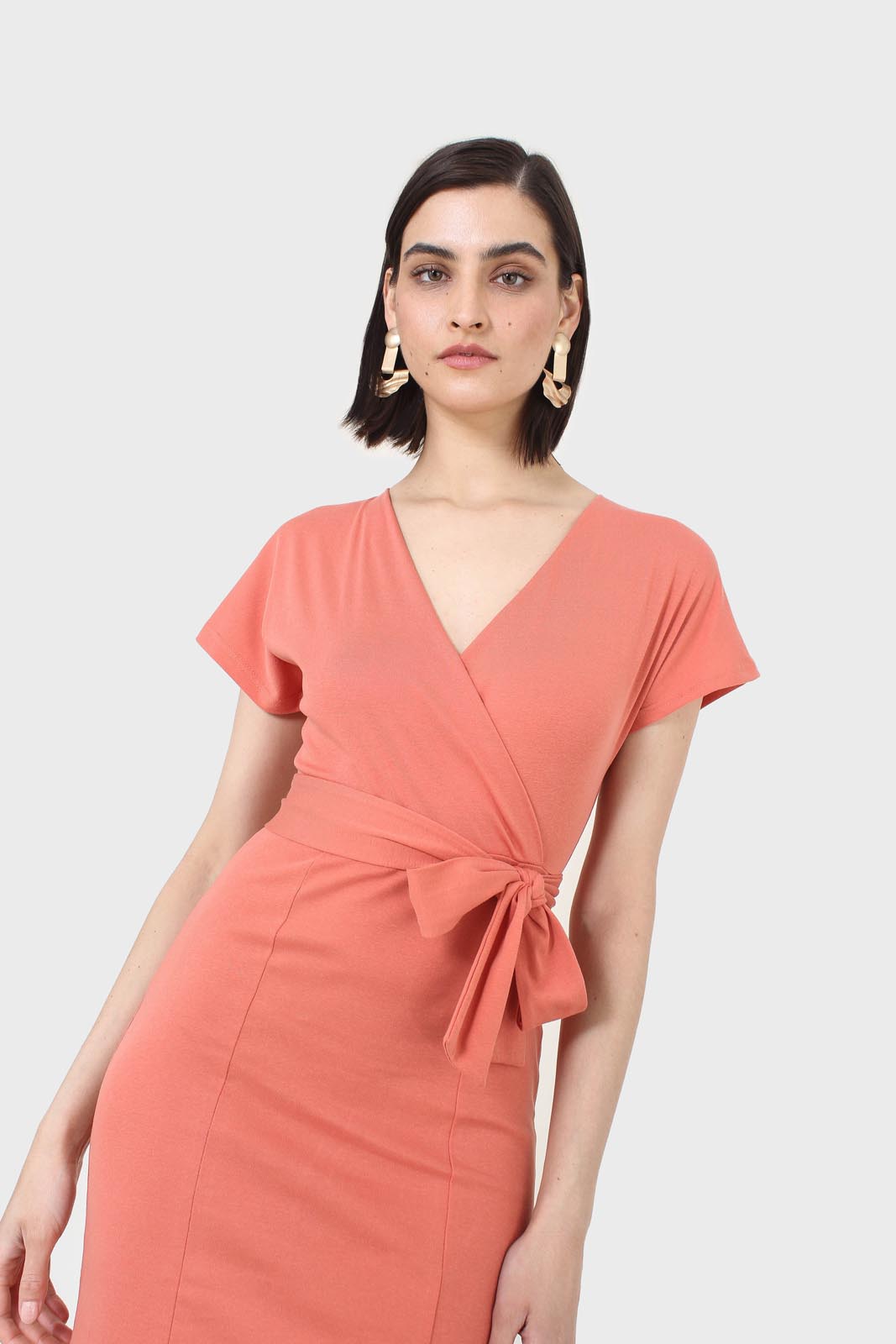 Orange short sleeved wrap dress