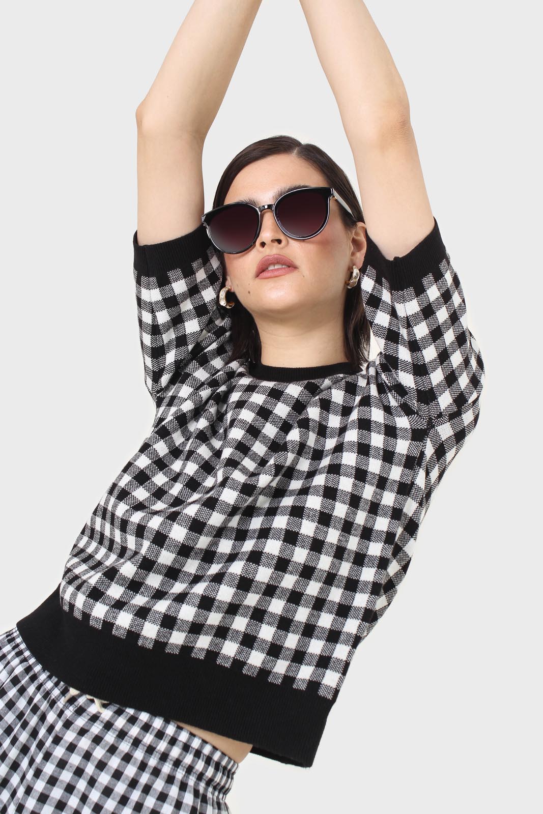 Black and ivory gingham check knit top
