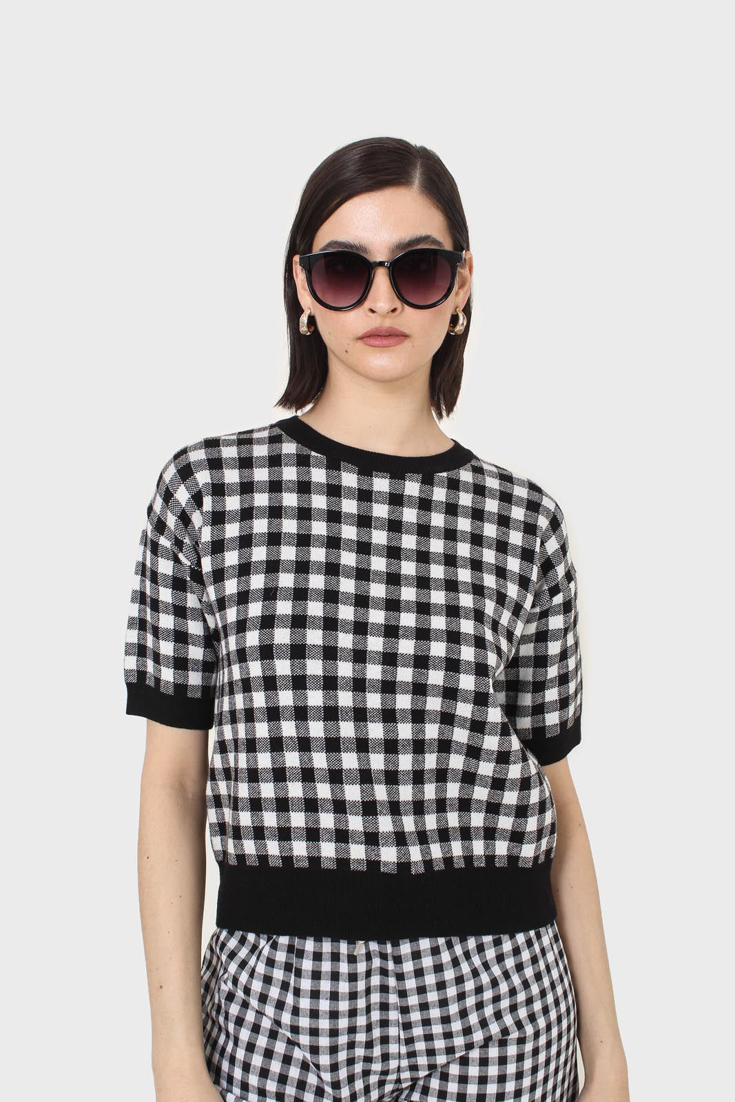 Black and ivory gingham check knit top