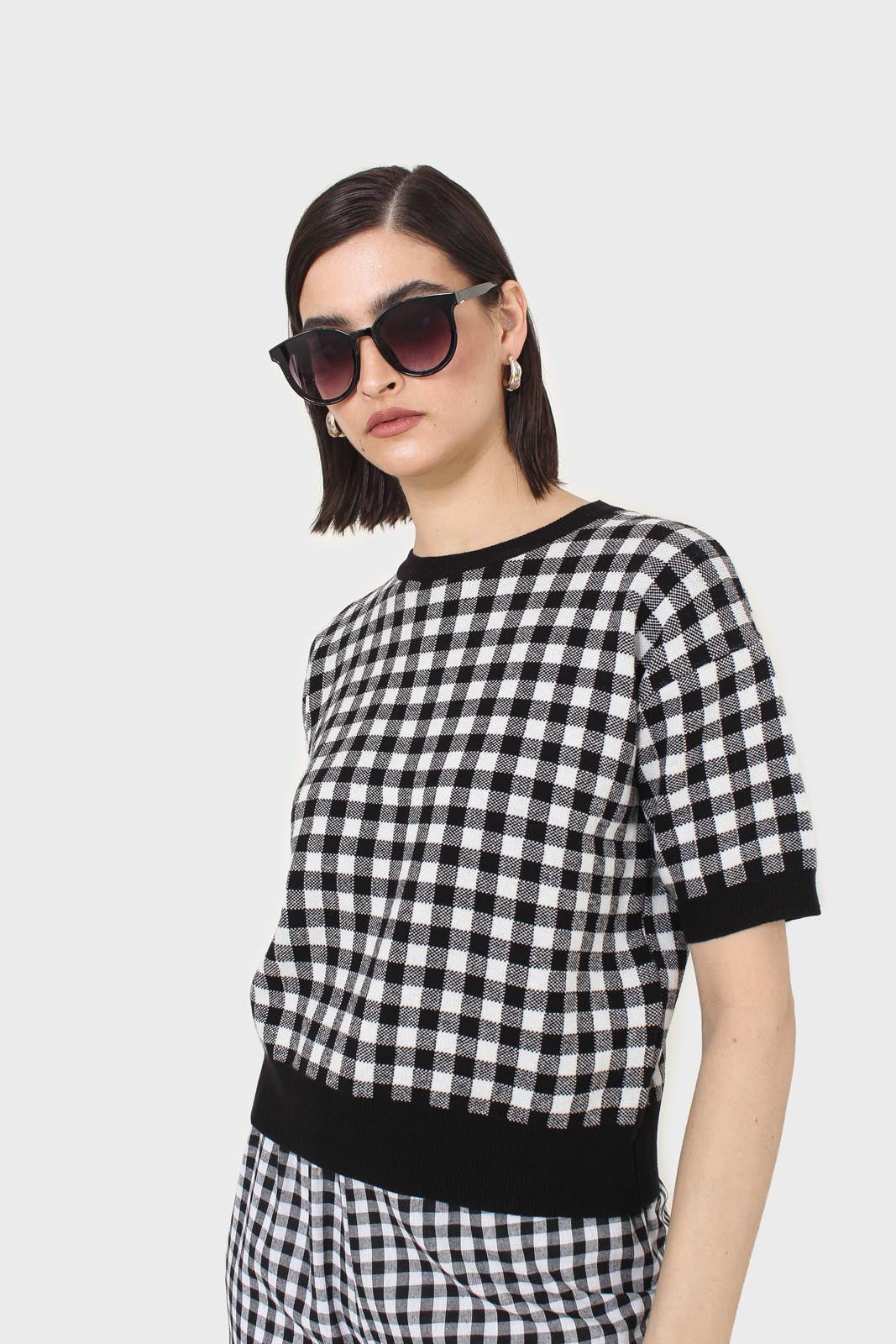 Black and ivory gingham check knit top