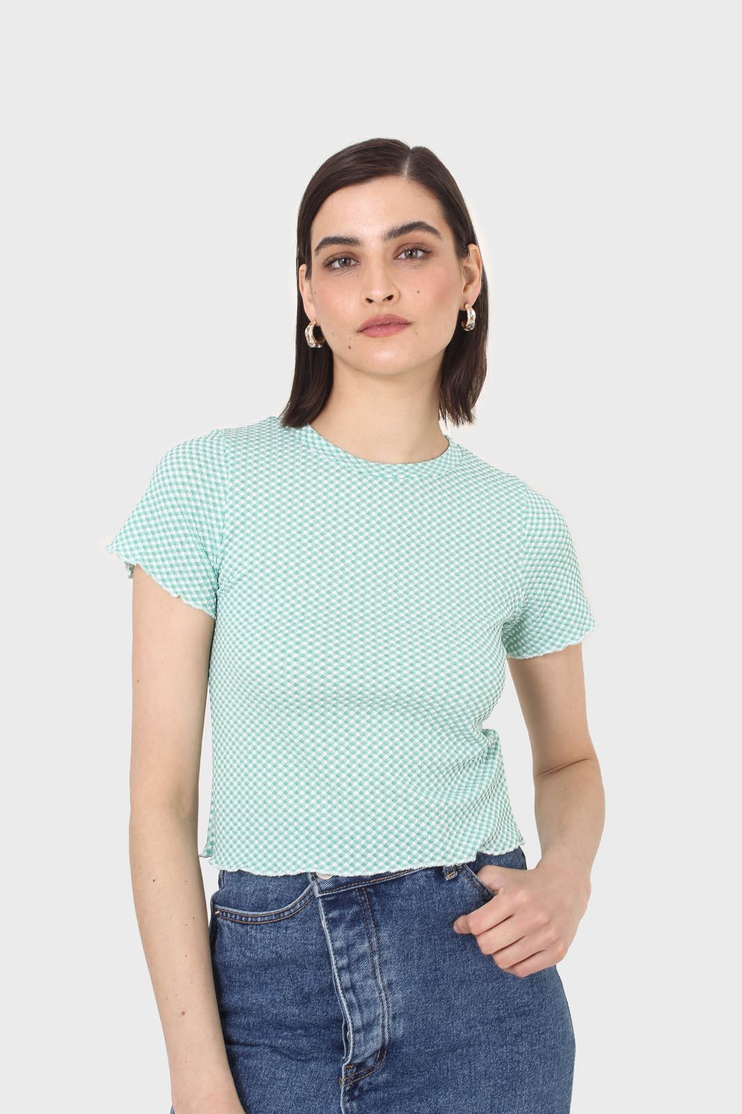Green and ivory lettuce hem top
