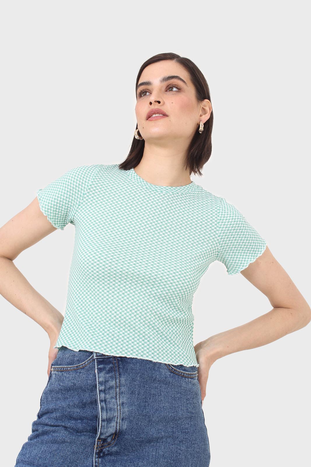 Green and ivory lettuce hem top
