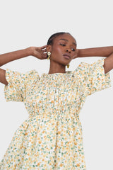 Ivory and orange tiny floral print ruched midi dress