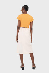 Ivory faux side button midi skirt