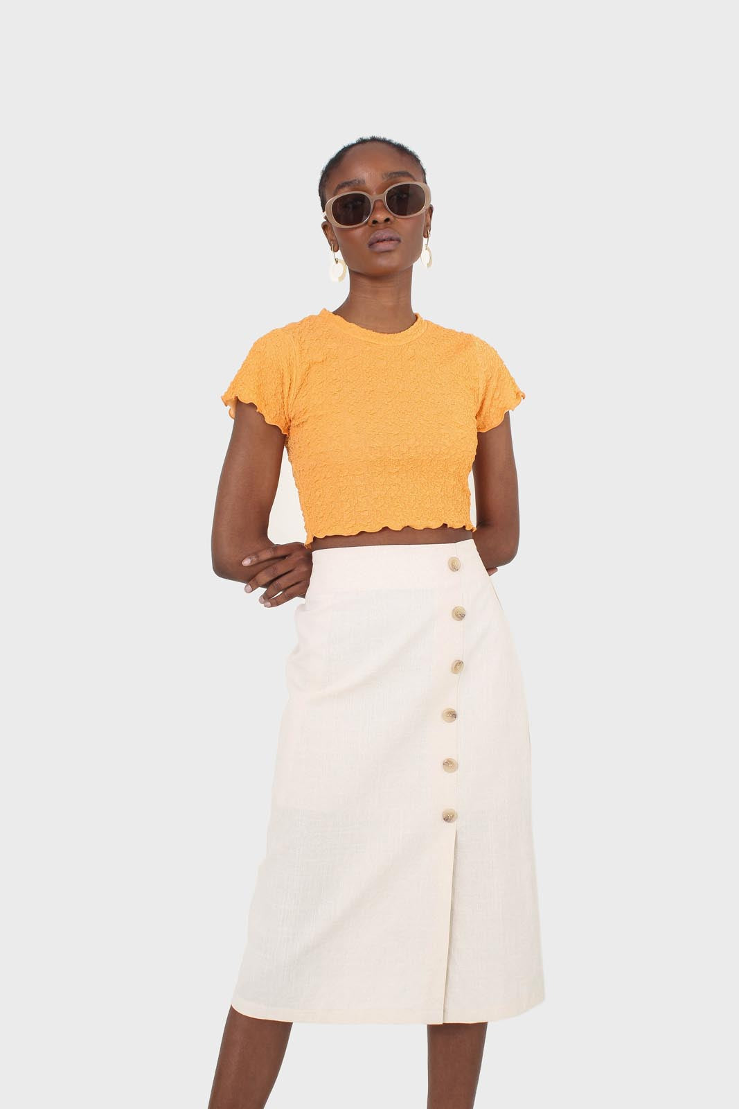 Ivory faux side button midi skirt