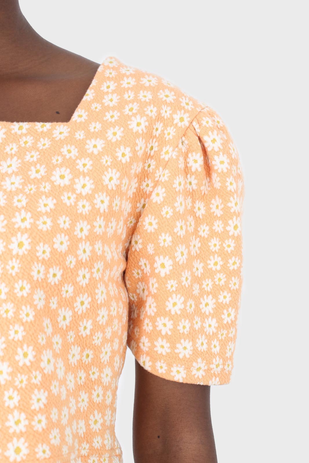Orange daisies square neckline puff sleeve cropped top