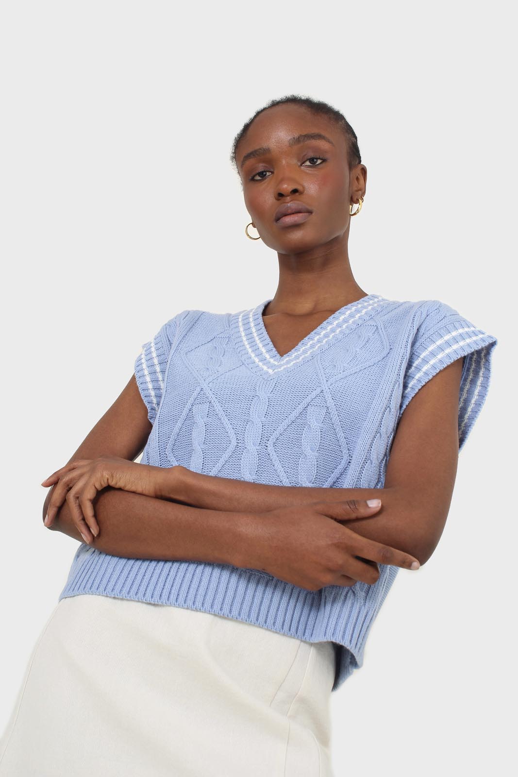 Light blue and white varsity cable sweater vest