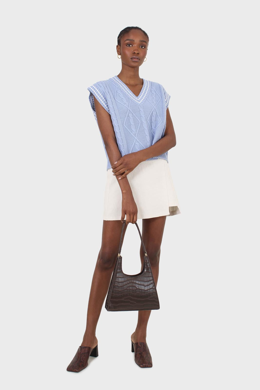 Light blue and white varsity cable sweater vest