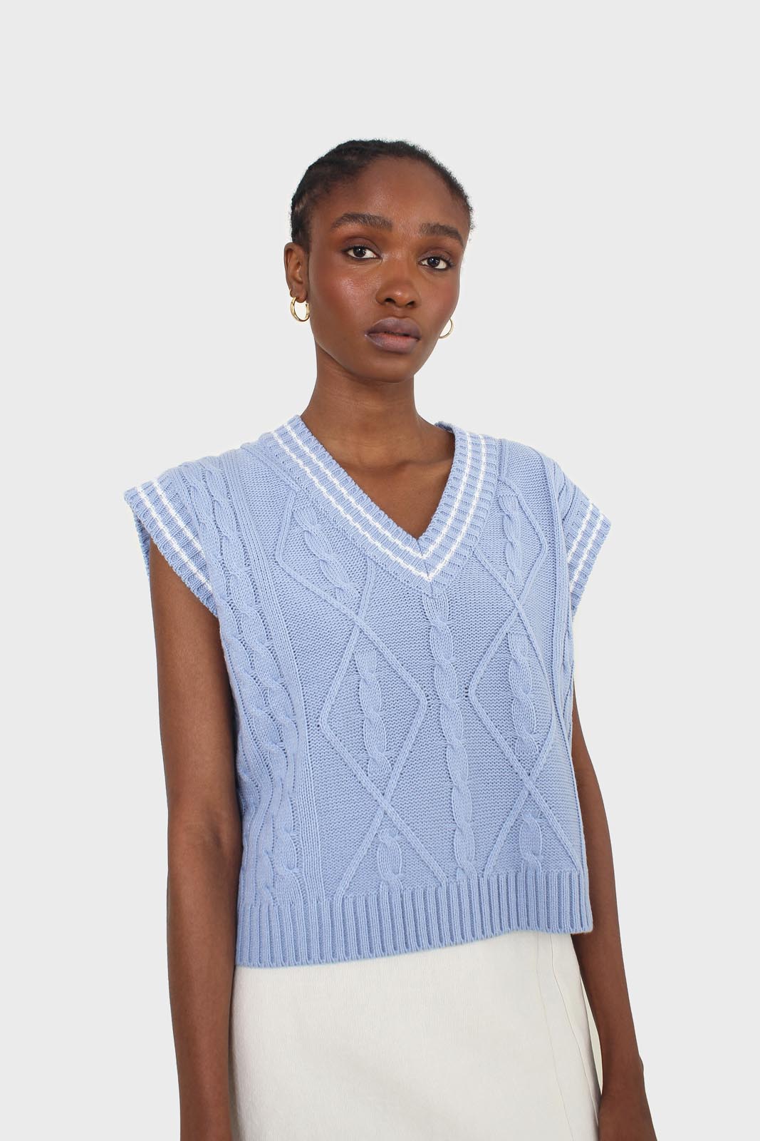 Light blue and white varsity cable sweater vest