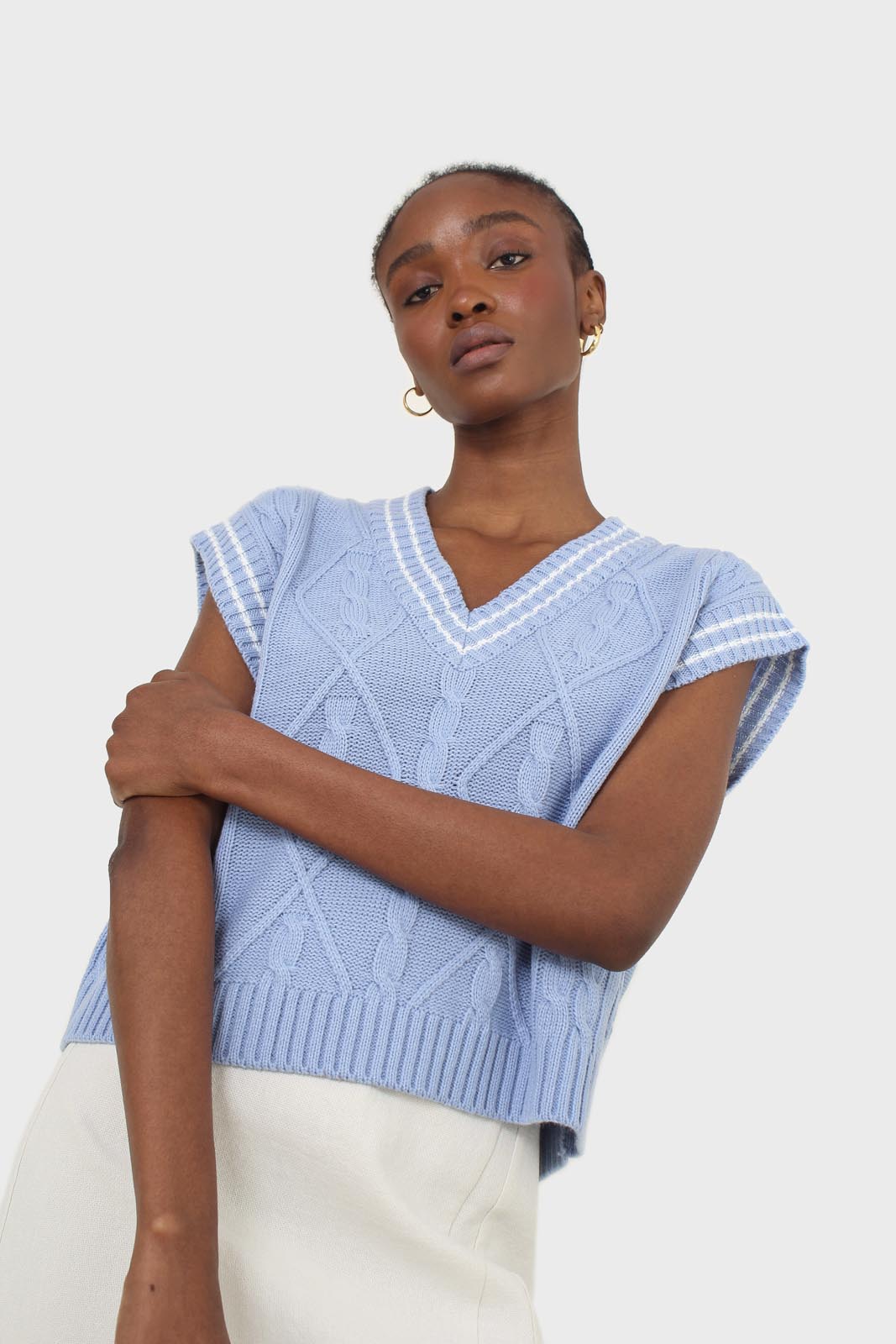 Light blue and white varsity cable sweater vest