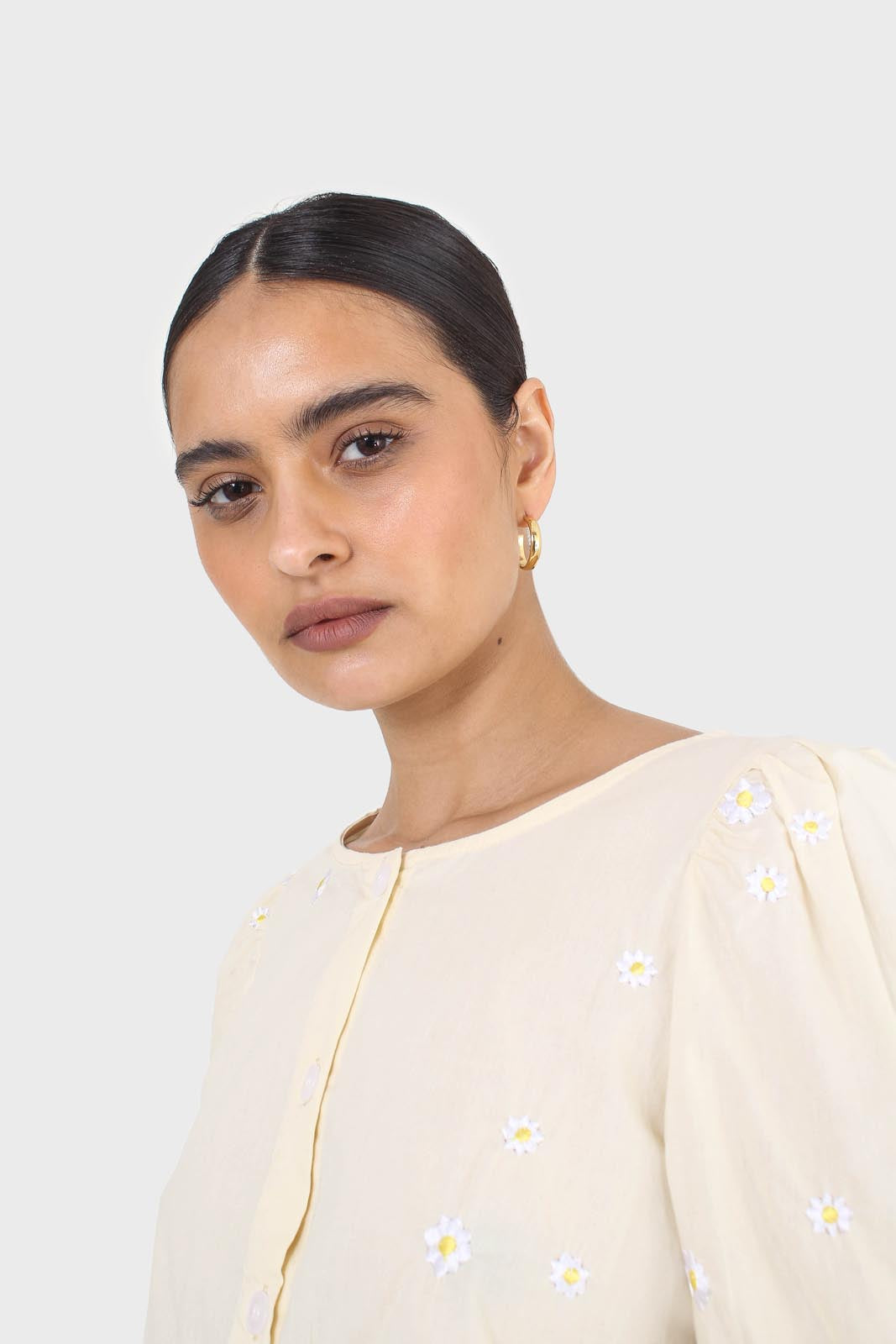 Yellow embroidered daisies peplum blouse