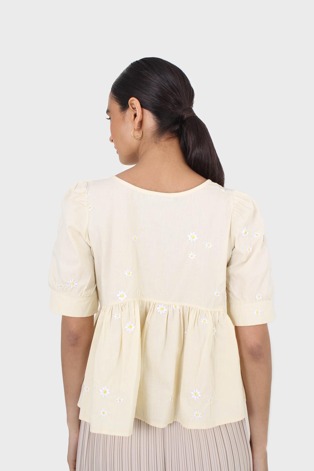 Yellow embroidered daisies peplum blouse