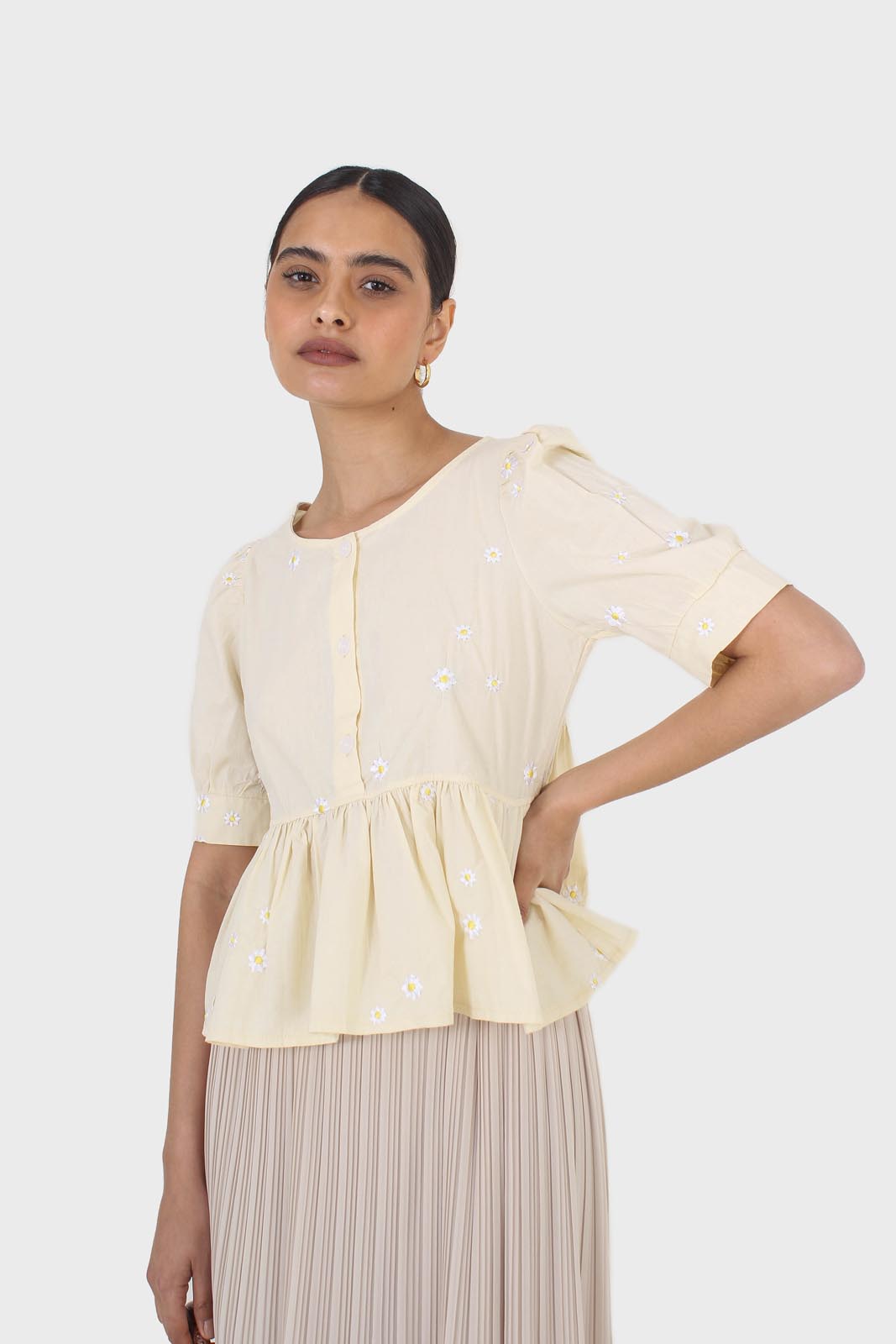 Yellow embroidered daisies peplum blouse