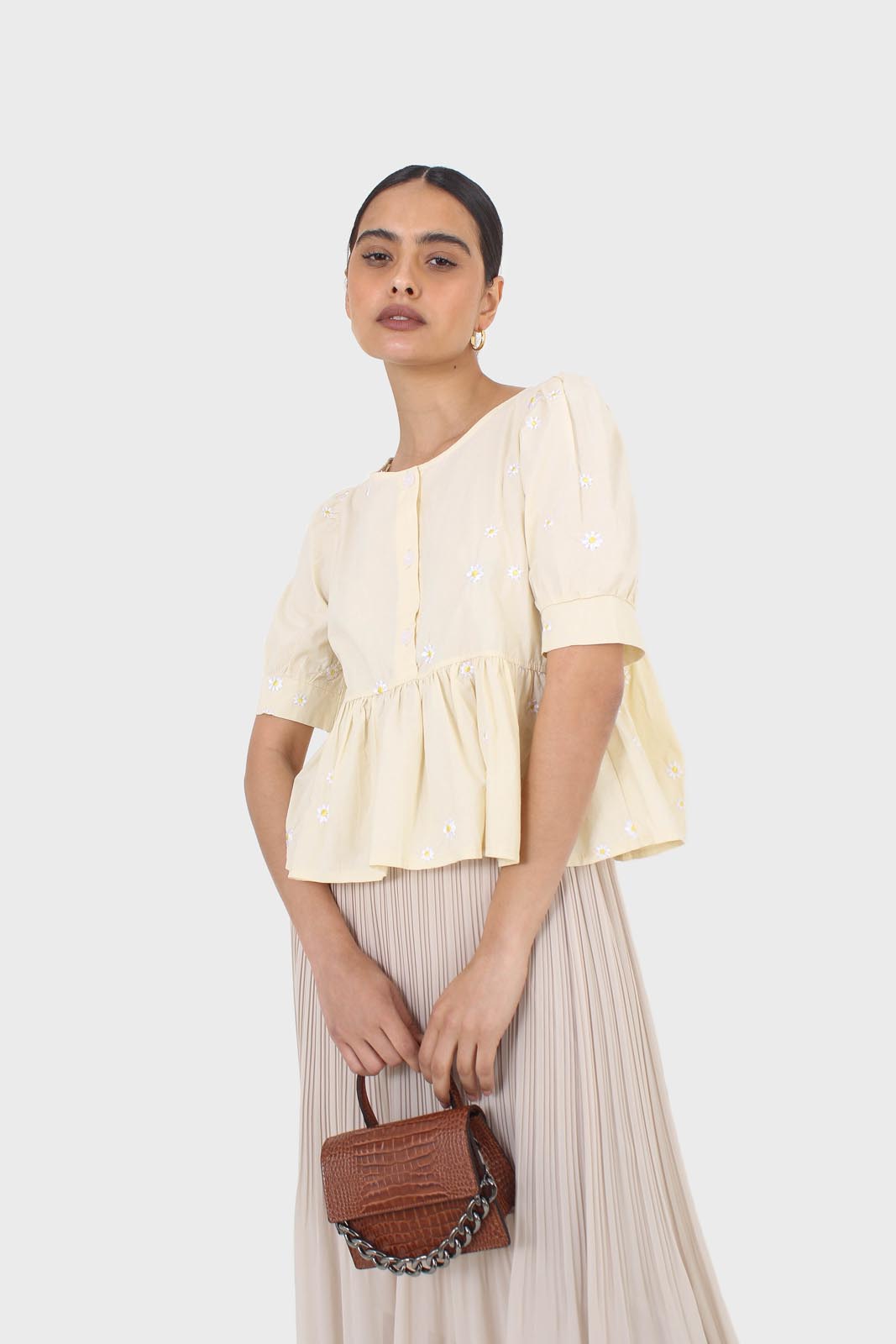 Yellow embroidered daisies peplum blouse