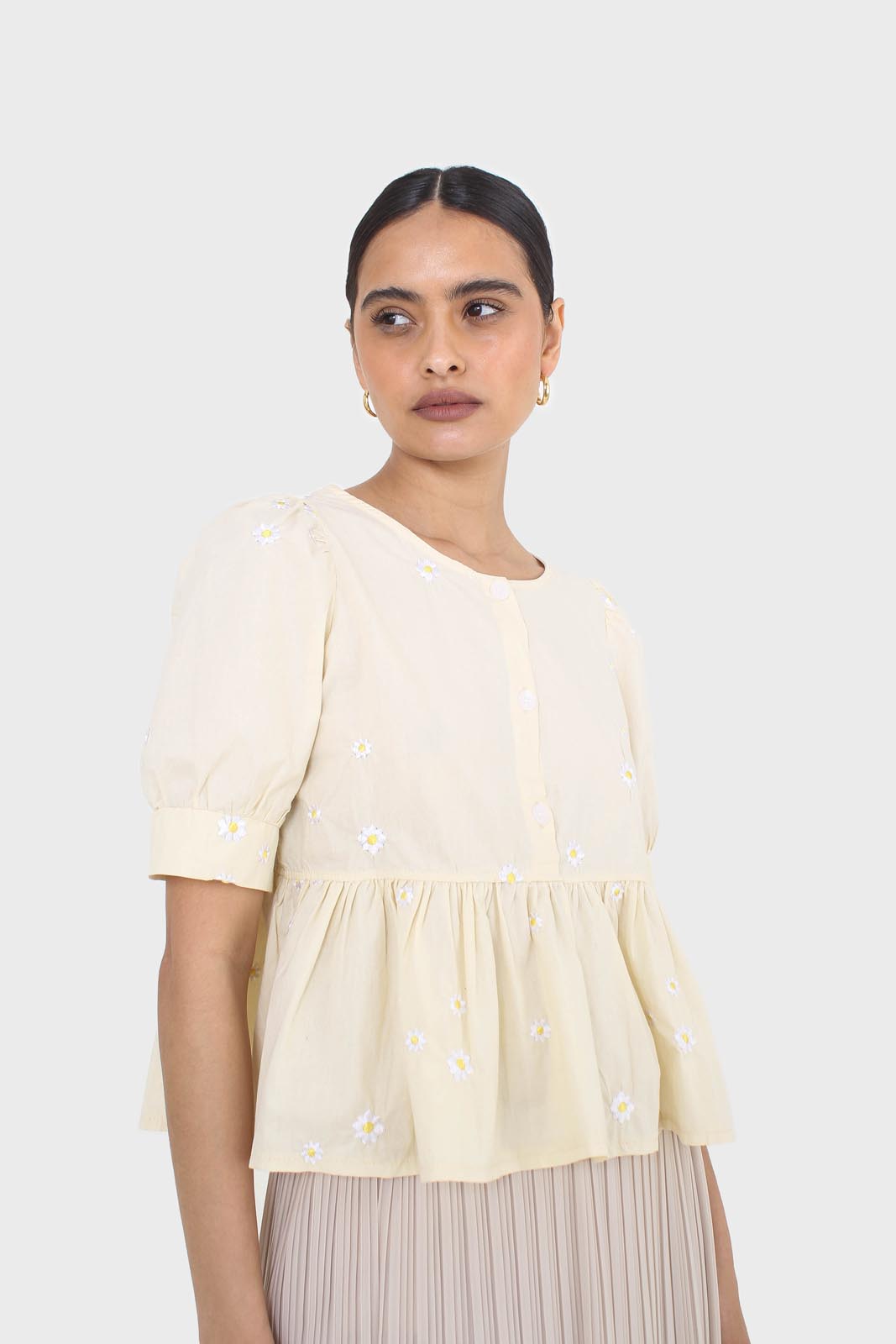 Yellow embroidered daisies peplum blouse