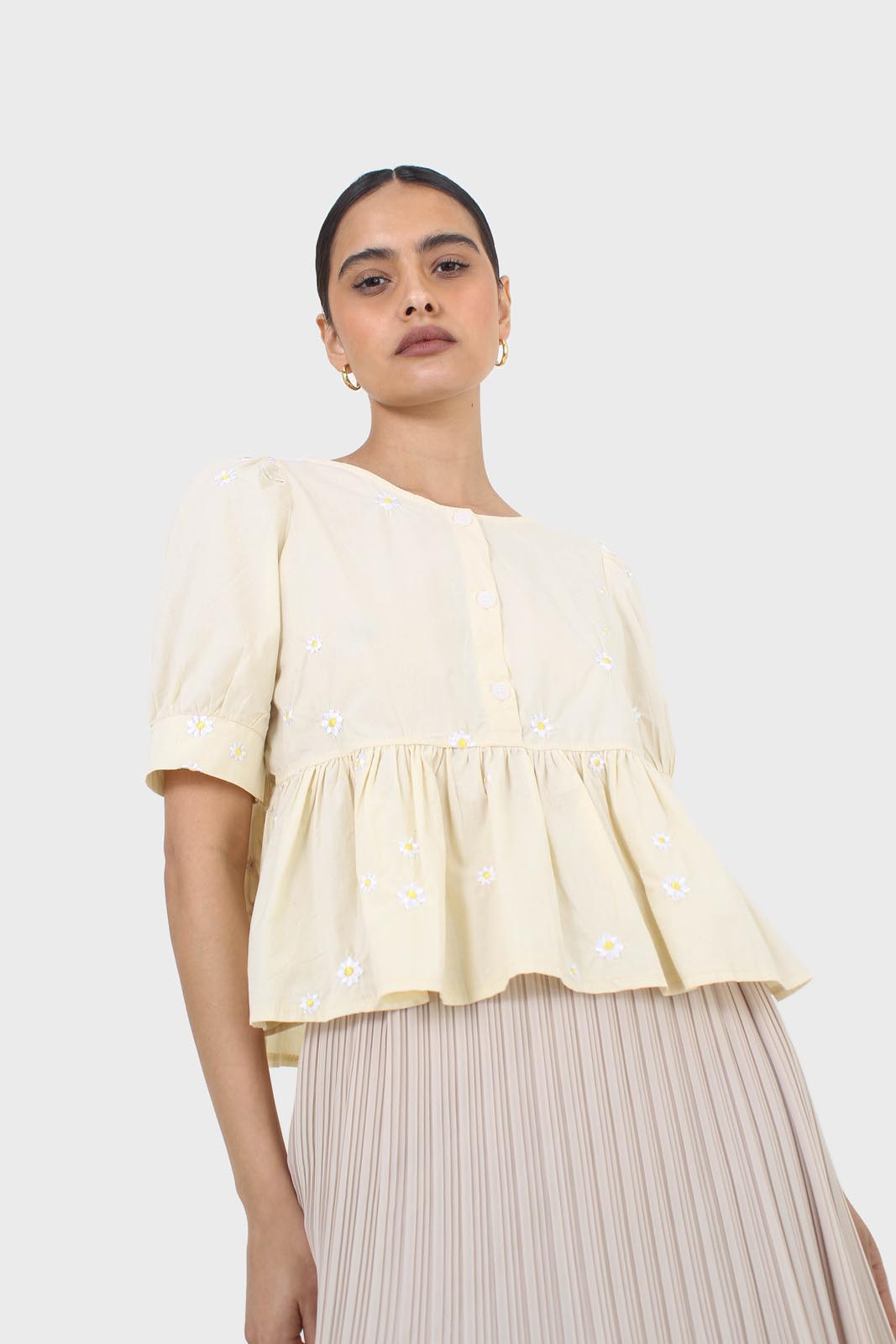 Yellow embroidered daisies peplum blouse