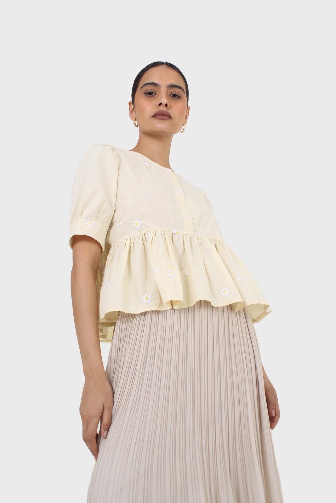 Yellow embroidered daisies peplum blouse