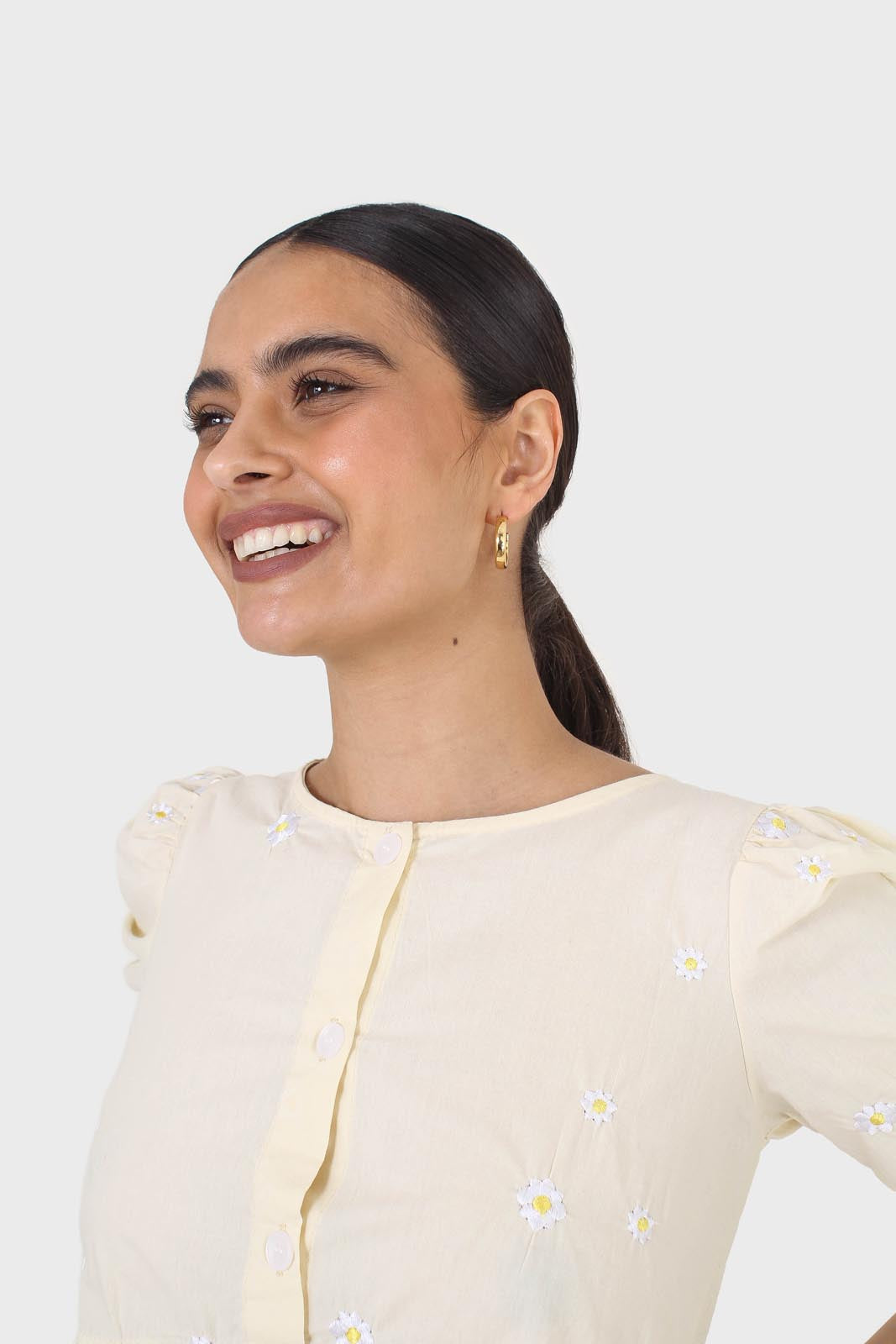Yellow embroidered daisies peplum blouse