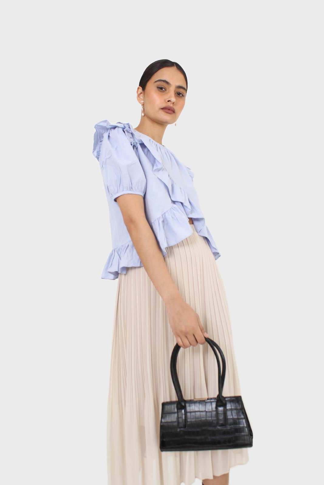 Sky blue asymmetric frill short sleeved top