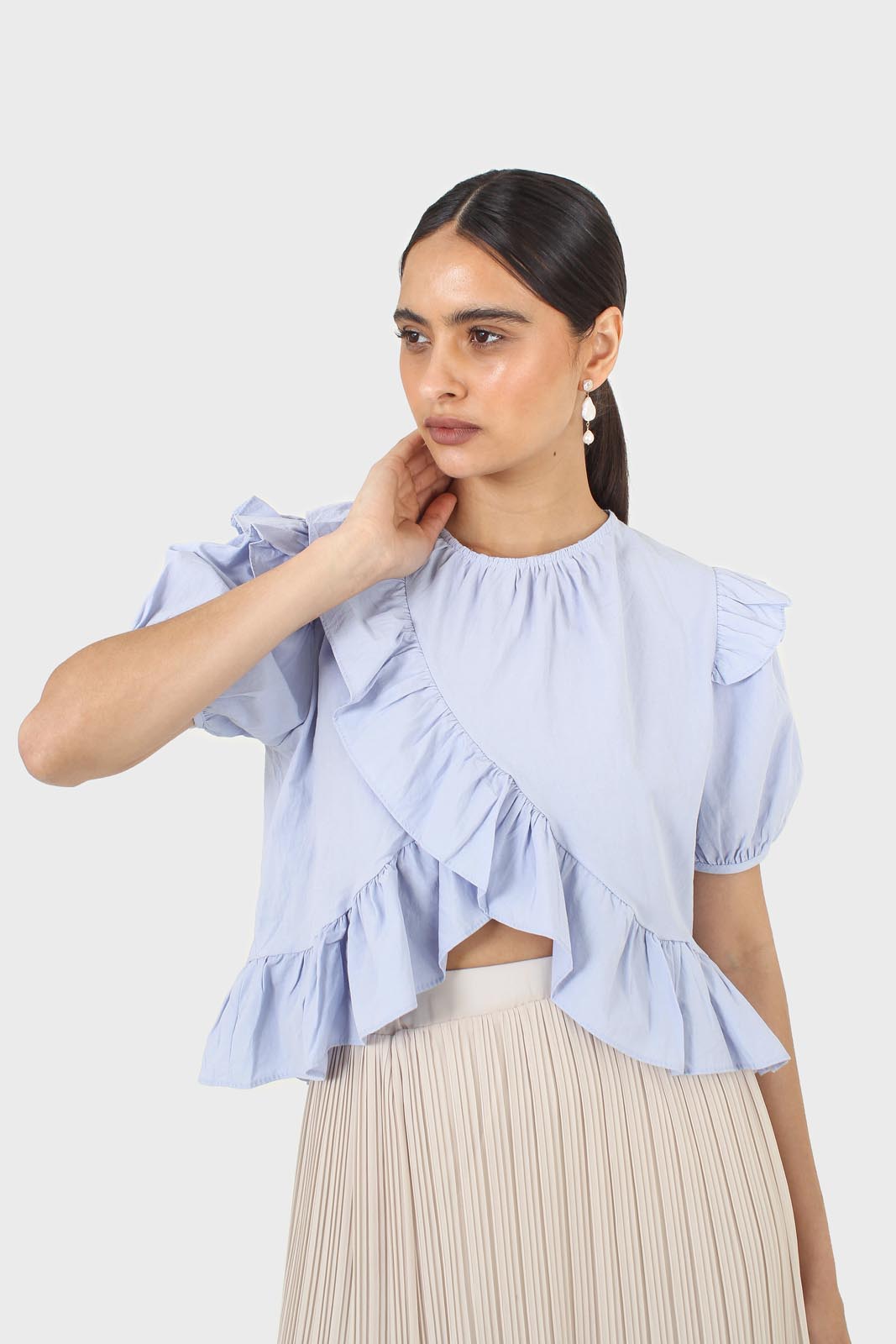 Sky blue asymmetric frill short sleeved top
