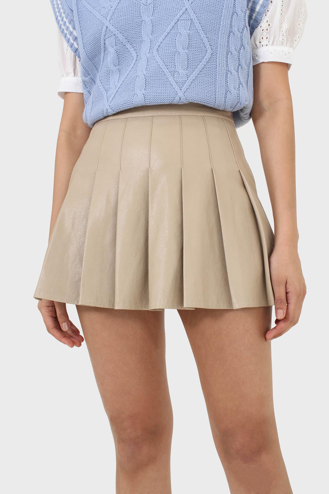 Beige waxed pleated mini skirt