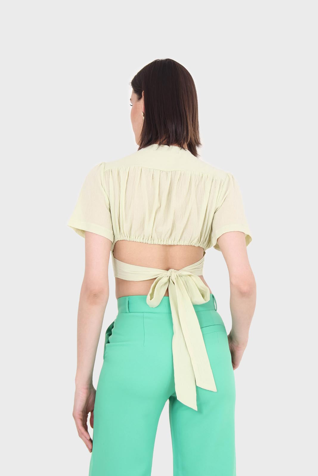 Light green deep V tie back cropped blouse