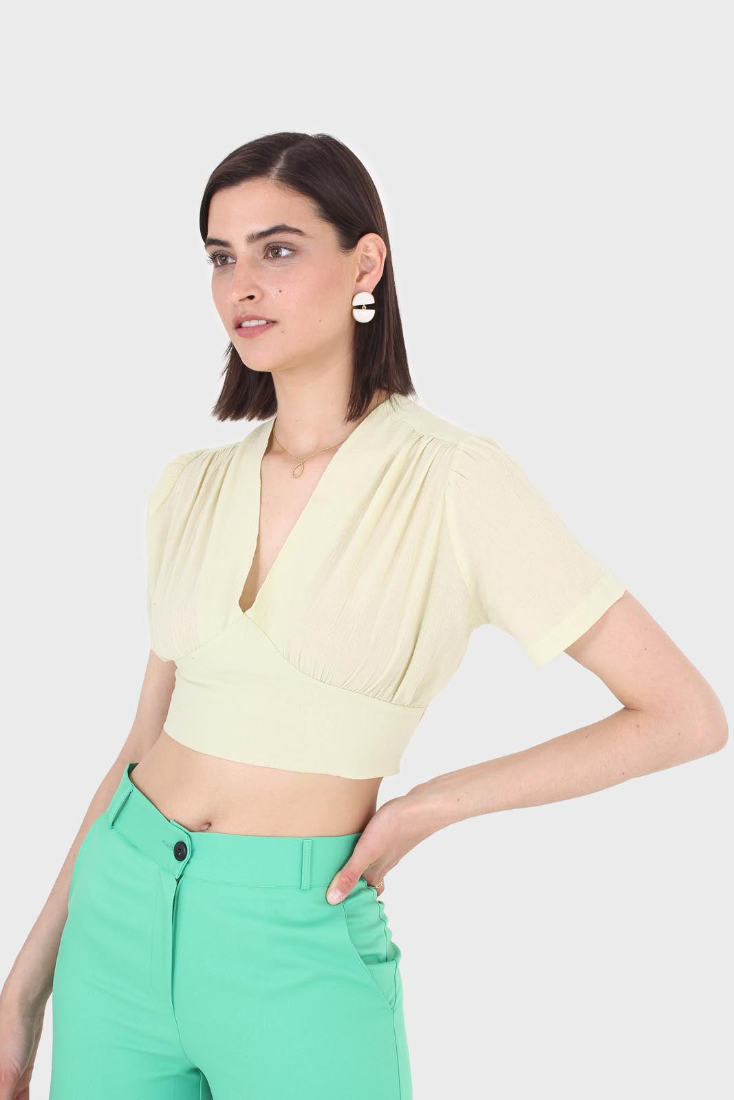 Light green deep V tie back cropped blouse