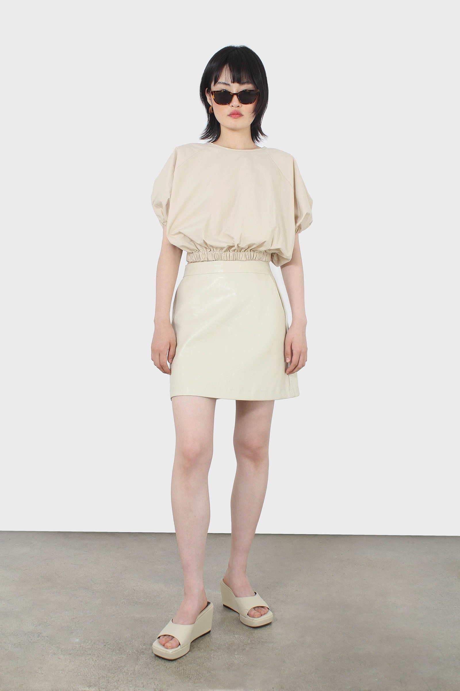 Beige ruched hem puff cropped top