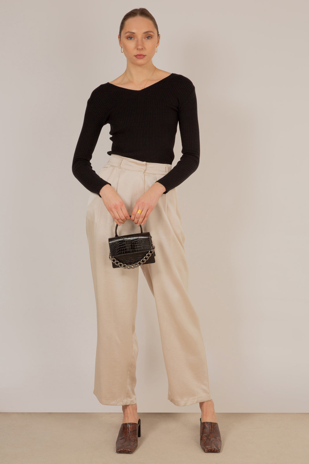 Black V-neck ribbed long sleeved knit top