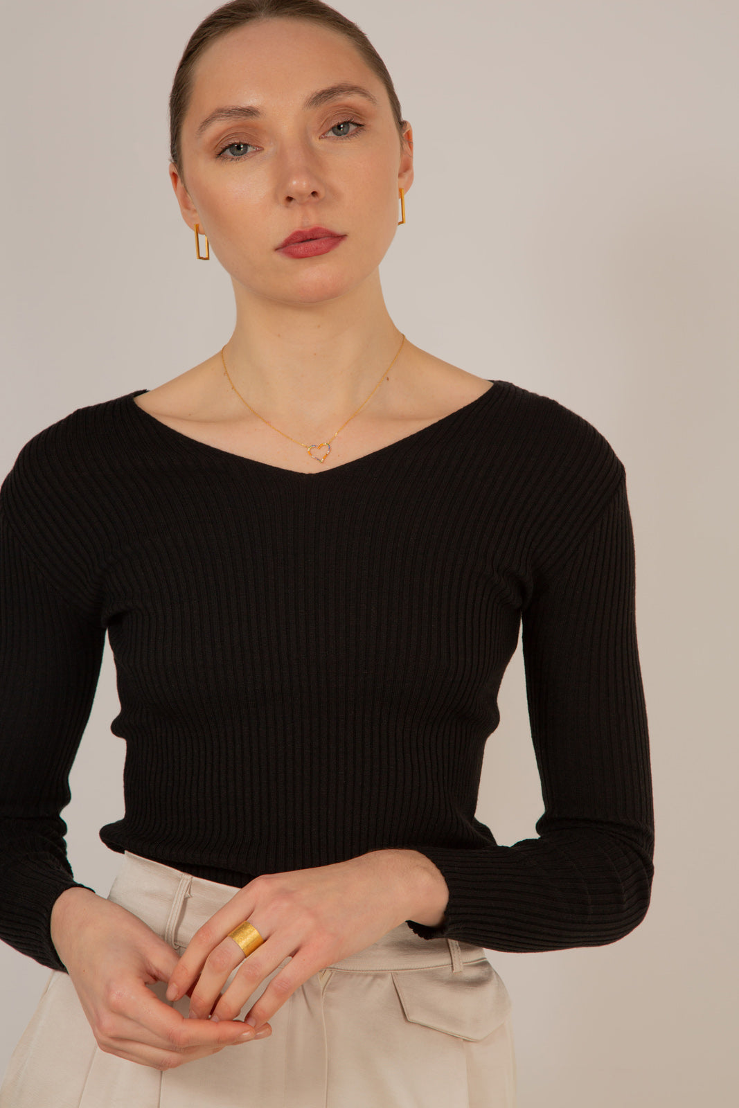 Black V-neck ribbed long sleeved knit top