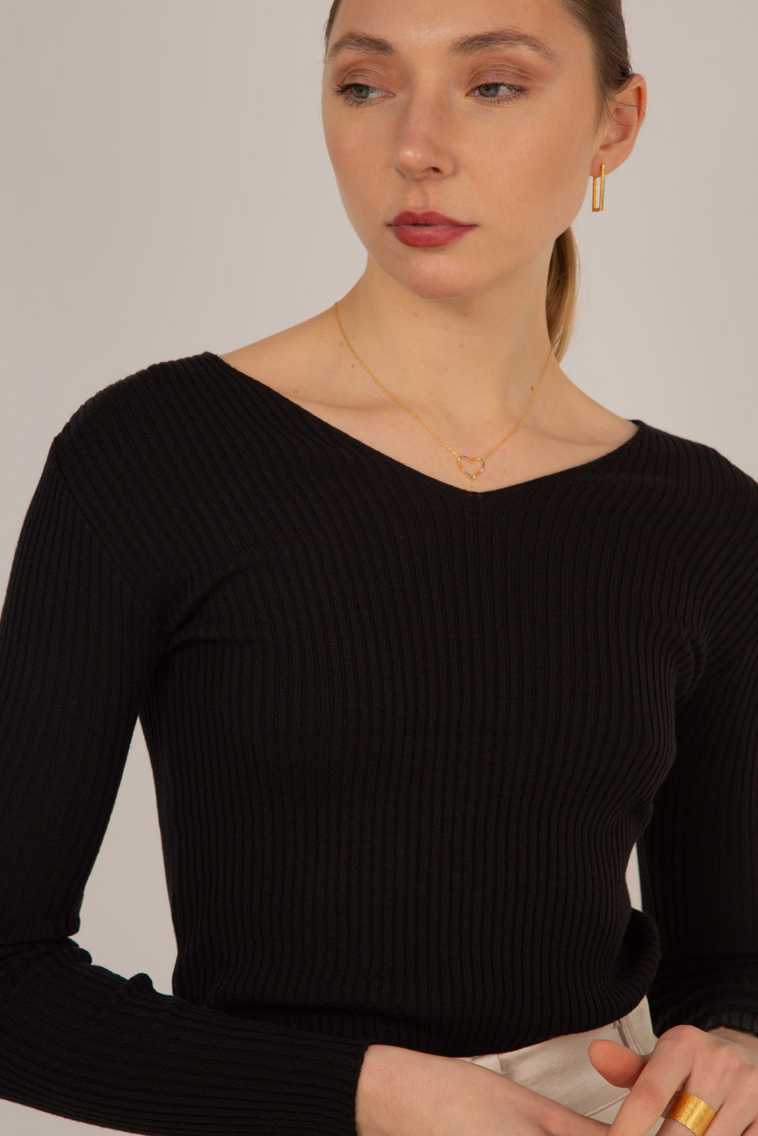 Black V-neck ribbed long sleeved knit top
