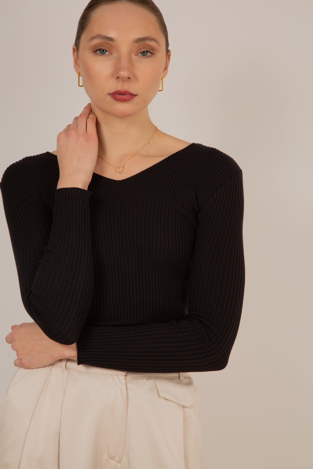 Black V-neck ribbed long sleeved knit top