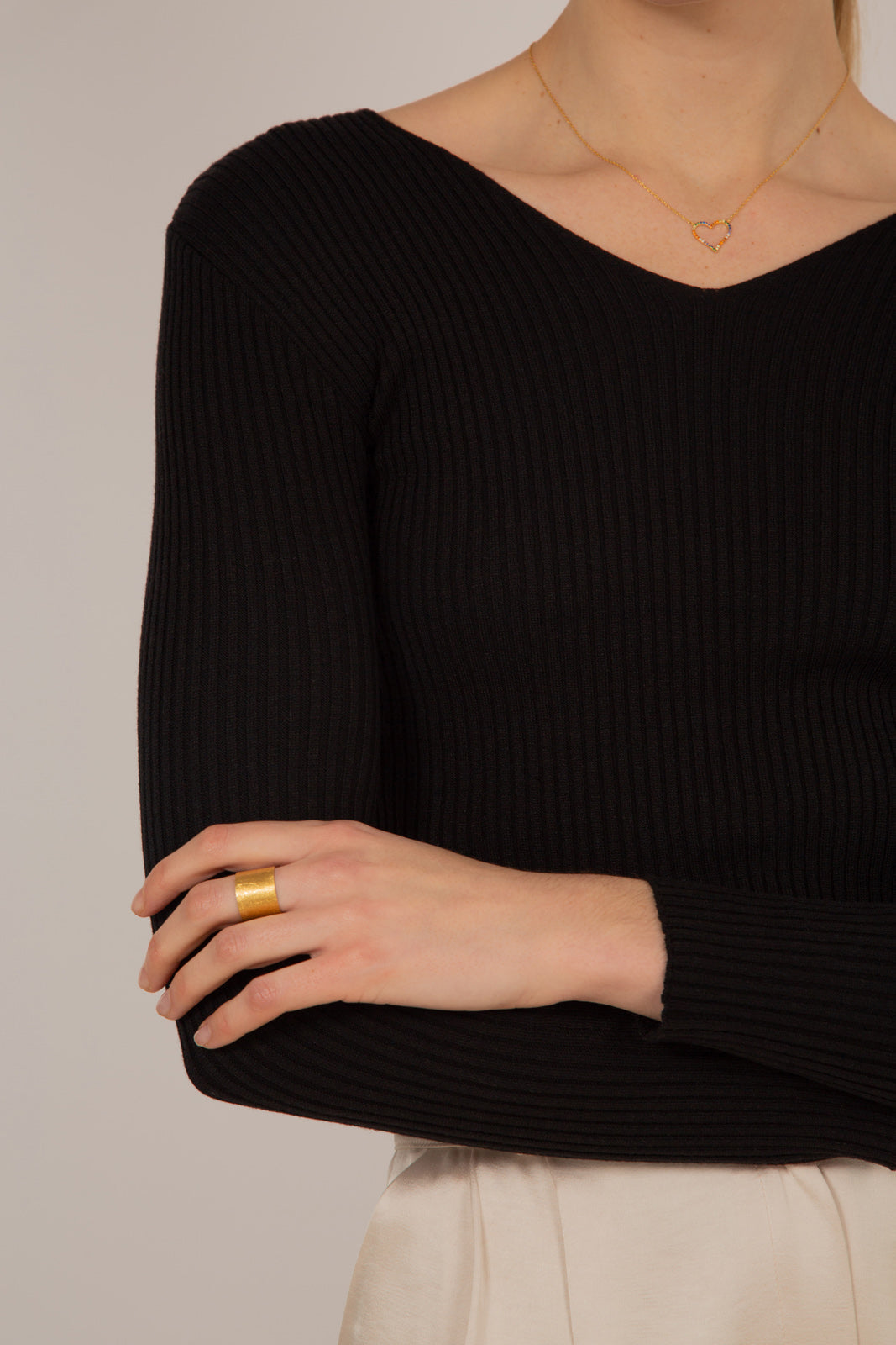 Black V-neck ribbed long sleeved knit top
