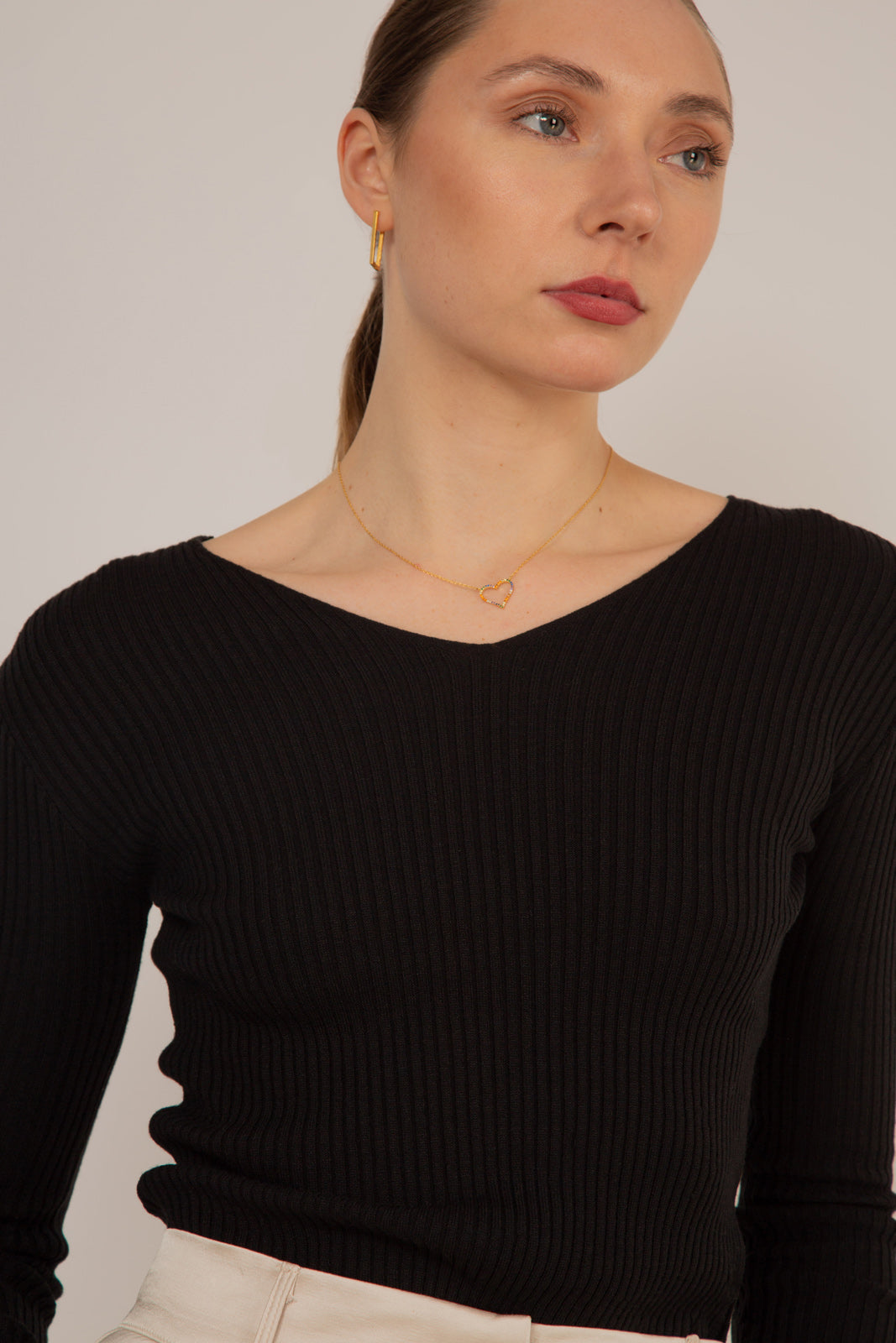 Black V-neck ribbed long sleeved knit top
