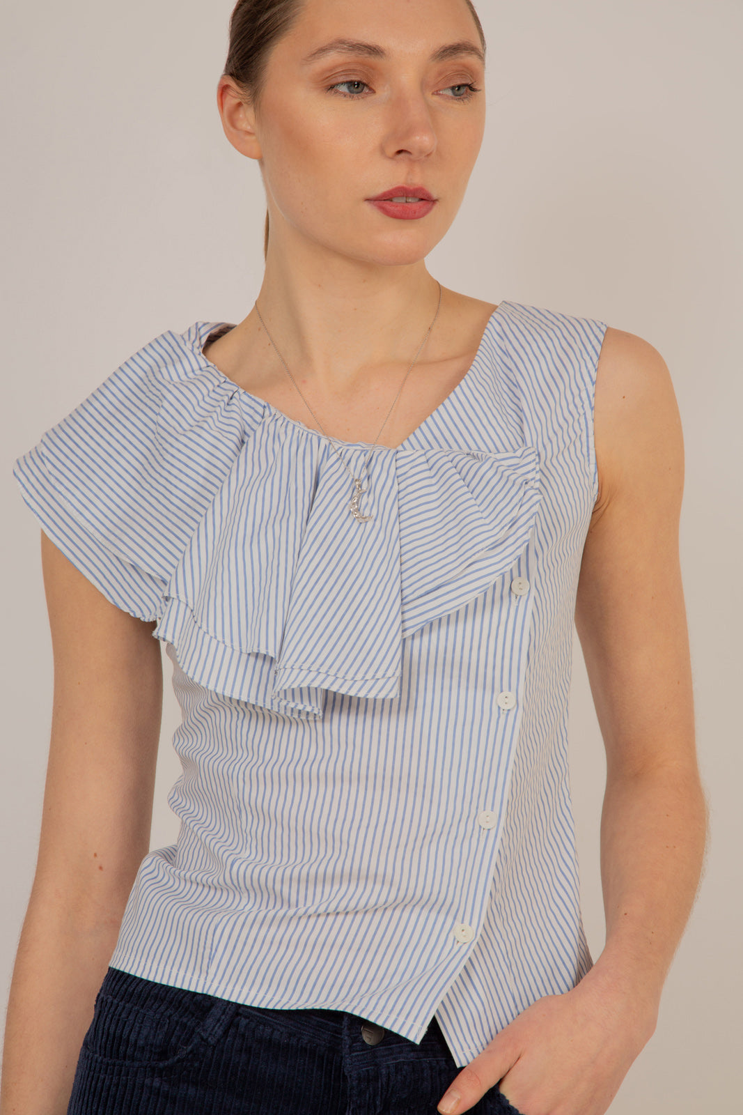 Blue and white striped asymmetric ruffle top