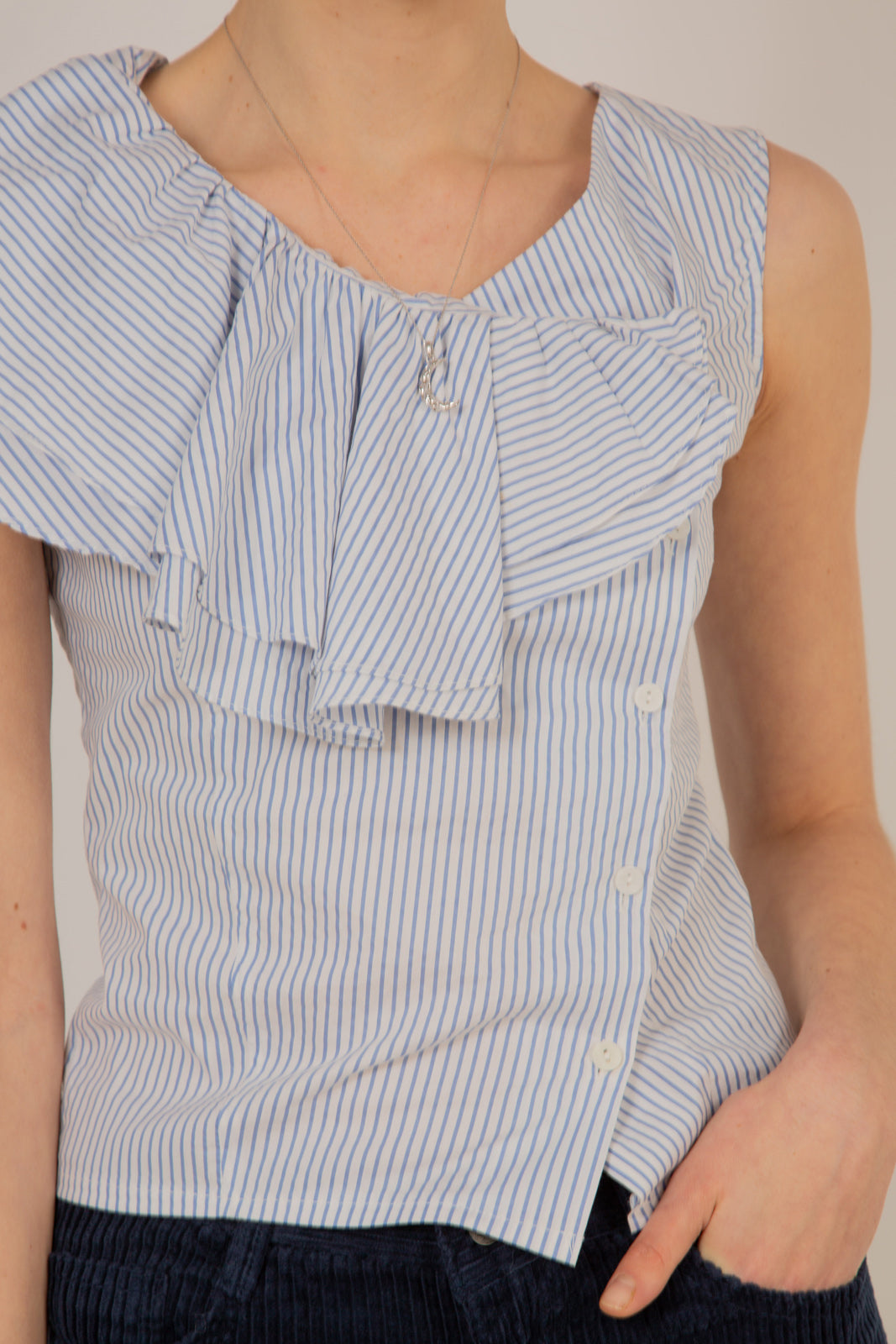 Blue and white striped asymmetric ruffle top