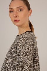 Ivory and black leopard print cropped long sleeved top