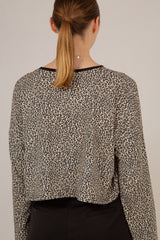 Ivory and black leopard print cropped long sleeved top
