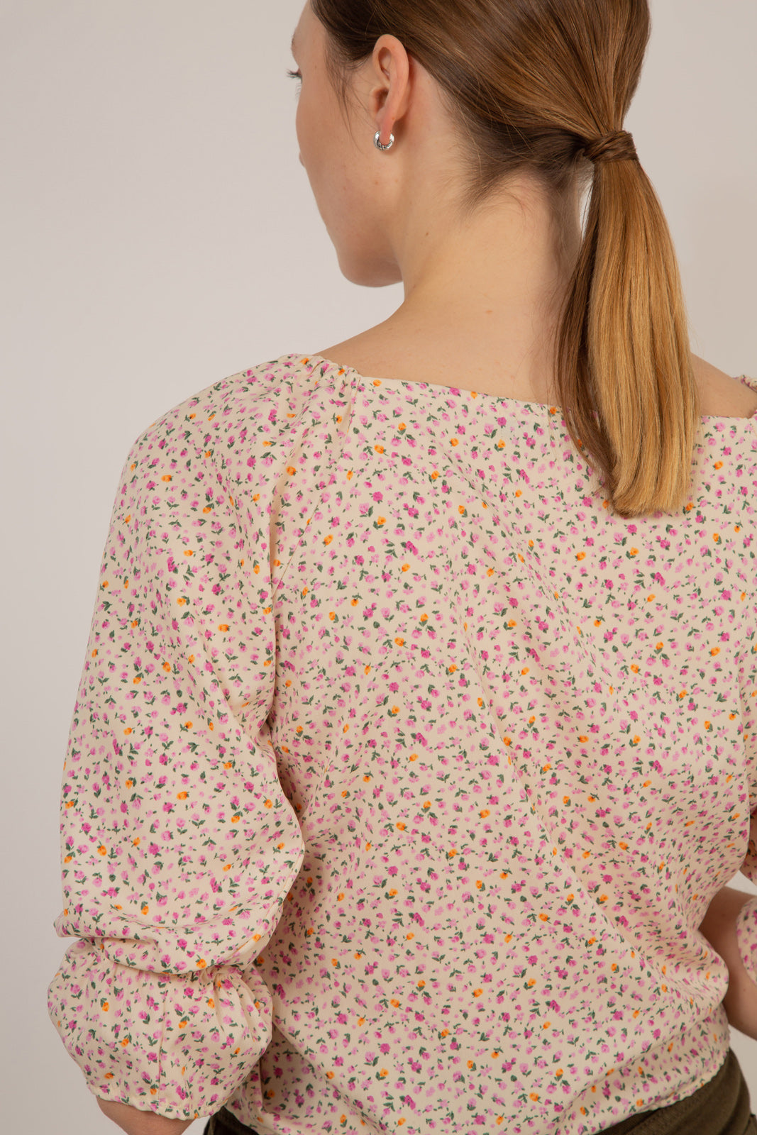 Ivory and pink floral double ruched long sleeved top