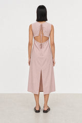 Baby pink tie up peek back dress